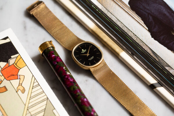UNIVERSAL GENEVE GILT SHADOW